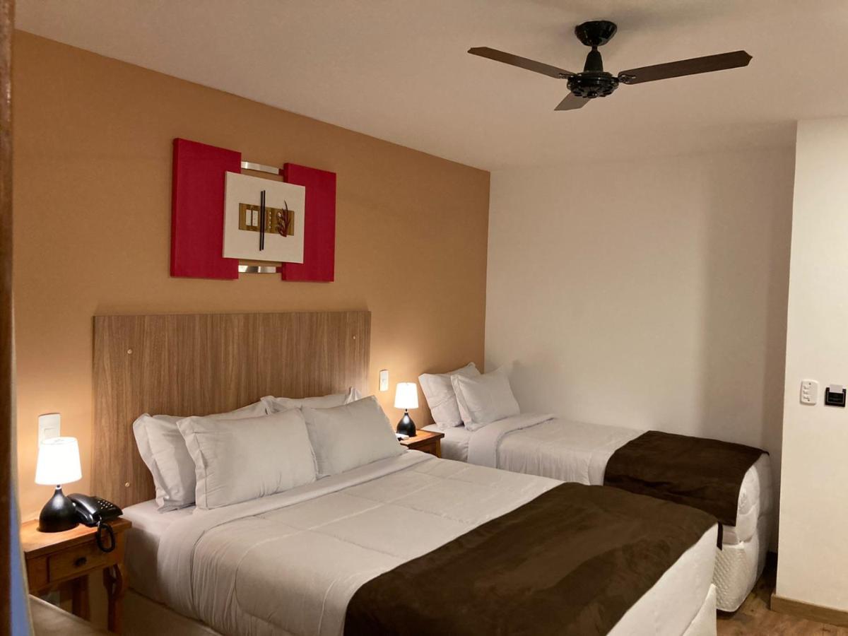 Quarto Triplo com Vista para a Montanha